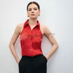 Plain buttoned sleeveless blouse - Image 2