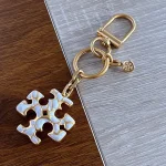 Tory Burch Gold & White Enamel Keychain – Signature Logo Charm