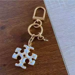 Tory Burch Gold & White Enamel Keychain – Signature Logo Charm - Image 12