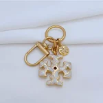 Tory Burch Gold & White Enamel Keychain – Signature Logo Charm - Image 6
