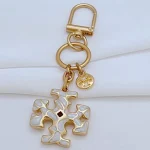 Tory Burch Gold & White Enamel Keychain – Signature Logo Charm - Image 7