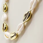 NEFERU Coastal Clash White & Gold Cowrie Shell Necklace
